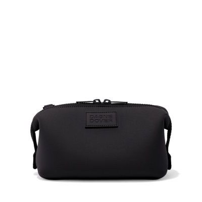 Small Dagne Dover Hunter Toiletry Bag in dark moss with multiple compartments and a sleek, compact design for travel organization.