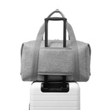 Dagne Dover Landon Neoprene Carryall Bag in Heather Grey, large duffel bag with spacious design and sturdy handles.