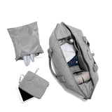Dagne Dover Landon Neoprene Carryall Bag in Heather Grey, extra large duffel bag with top-down view, showcasing sleek design and spacious interior.