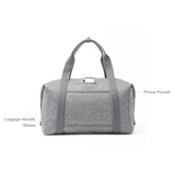 Dagne Dover Landon Neoprene Carryall Bag in extra large size, showing the back view with mobile pocket and sleek black design.