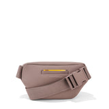 Dagne Dover Ace Neoprene Fanny Pack in dune color, featuring adjustable strap and compact design for hands-free carrying.
