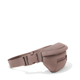 Dagne Dover Ace Neoprene Fanny Pack in dune color with adjustable strap and zip closure, worn around the waist or across the body.