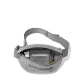 Dagne Dover Ace neoprene fanny pack in dune color, stylish waist bag with adjustable strap and multiple compartments.