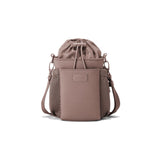 Dagne Dover Sloan water bottle sling in Dune color, compact design with adjustable strap and easy-access pocket.