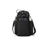 Dagne Dover Sloan water bottle sling in Onyx, compact and stylish with a front pocket, designed for carrying water bottles easily.