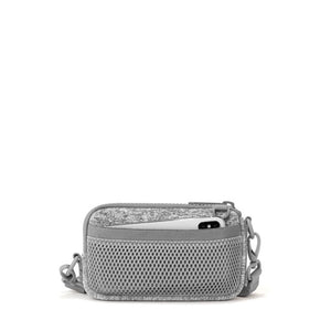 Dagne Dover Mara Phone Sling in Heather Grey, made of neoprene, shown from the back with adjustable strap and compact design