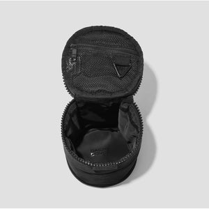 Small black Dagne Dover Mila toiletry organizer with multiple compartments and zipper closure, ideal for travel toiletries.
