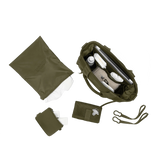 Dark moss Dagne Dover Wade diaper tote bag with multiple compartments and handles, designed for easy baby care organization.