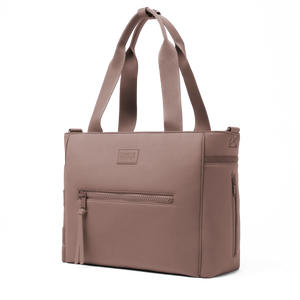 Dagne Dover Wade diaper tote bag in Dune color, featuring multiple compartments and adjustable straps for convenient baby essentials storage.