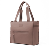 Dagne Dover Wade diaper tote bag in Dune color, featuring multiple compartments and adjustable straps for convenient baby essentials storage.