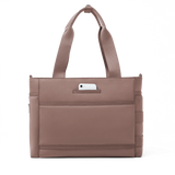 Dagne Dover Wade Diaper Tote bag in Dune color with multiple compartments and stylish design for parents on the go.