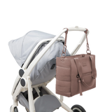 Dagne Dover Wade diaper tote in Dune color with multiple pockets and handles, designed for convenient baby care organization.