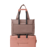 Dagne Dover Wade diaper tote bag in Dune with multiple interior compartments and adjustable shoulder strap.