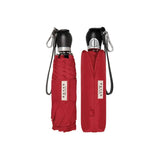 Fuchsia pink Davek The Commuter Umbrella open with sturdy silver handle and compact design, perfect for daily rain protection.