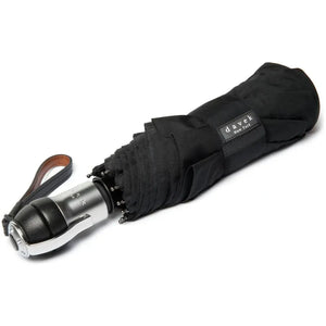 Black Davek Solo Umbrella open, showcasing its compact design and sturdy canopy, ideal for rain protection.