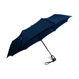 Black Davek Solo umbrella open, showcasing its compact design and sturdy frame, ideal for rain protection.