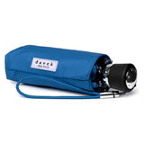 Compact Davek Mini Umbrella open, showcasing its sturdy canopy and sleek design, perfect for portable rain protection.