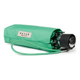 Turquoise Davek Mini Umbrella open, compact travel umbrella with sturdy frame and ergonomic handle, designed for portability.