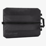 Eagle Creek Pack-It Reveal Shoe Sack with clear window and black fabric, designed for organizing shoes during travel.