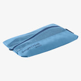 Eagle Creek Pack-It Reveal Shoe Sack with clear side panel and black fabric, designed for organizing shoes in luggage.