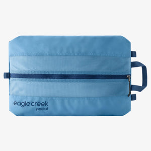 Eagle Creek Pack-It Reveal Shoe Sack with transparent design and zipper closure, holding a pair of shoes for travel organization.