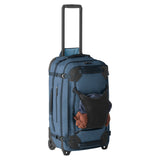 Blue Eagle Creek Gear Warrior XE 2-wheel 27-inch luggage with durable hard shell and ergonomic handle, ready for travel.