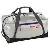 Eagle Creek Migrate Duffel 40L in black with durable fabric and carrying handles, packed with travel gear.