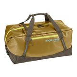 Eagle Creek Migrate Duffel 90L in black with handles and a zipper closure, showcasing its durable travel design.