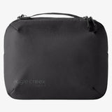 Eagle Creek Pack-It Reveal Tri-Fold Toiletry Kit in mandarin with multiple compartments for travel organization