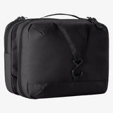Eagle Creek Pack-It Reveal Tri-Fold Toiletry Kit in mandarin with multiple compartments and zipper closures for travel organization