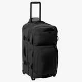 Olive green Eagle Creek ORV 30-inch 115L travel trunk with sturdy wheels and reinforced corners for durable travel storage.