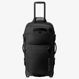 Olive green Eagle Creek ORV 30-inch 115L trunk with sturdy handle and reinforced corners for durable travel storage.