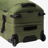 Olive green Eagle Creek ORV 30-inch 115L trunk with sturdy handle and wheels, durable travel luggage with reinforced corners.