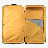 Olive green Eagle Creek ORV 30-inch 115L travel trunk with sturdy wheels and secure latches for durable luggage.