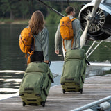 Olive green Eagle Creek ORV 30-inch 115L travel trunk with sturdy wheels and durable hard shell for versatile luggage storage.