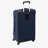 Eagle Creek Expanse 4-Wheel 30-inch travel suitcase in pilot blue with four spinning wheels and durable hard-shell design.