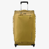 Eagle Creek Expanse 4-Wheel 30-inch travel luggage in pilot blue with a sturdy handle and four spinning wheels.