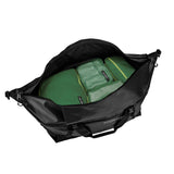Eagle Creek Migrate Wheeled Duffel 110L in black with sturdy wheels and handle, spacious travel duffel bag for packing and transport.