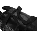 Eagle Creek Migrate Wheeled Duffel 110L in black, with large wheels and extendable handle for travel and heavy packing.