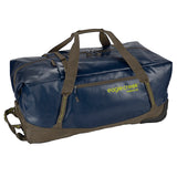 Eagle Creek Migrate Wheeled Duffel 110L in black with sturdy wheels and adjustable handle, designed for durable travel and heavy packing.