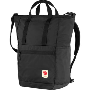 Fjallraven High Coast Totepack in black with adjustable shoulder straps and main compartment, designed for versatile carrying.