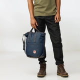 Fjallraven High Coast Totepack backpack in black with adjustable shoulder straps and a spacious main compartment.