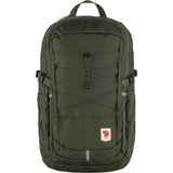 Fjallraven Skule 28 backpack in green with multiple compartments and adjustable straps, designed for outdoor and daily use