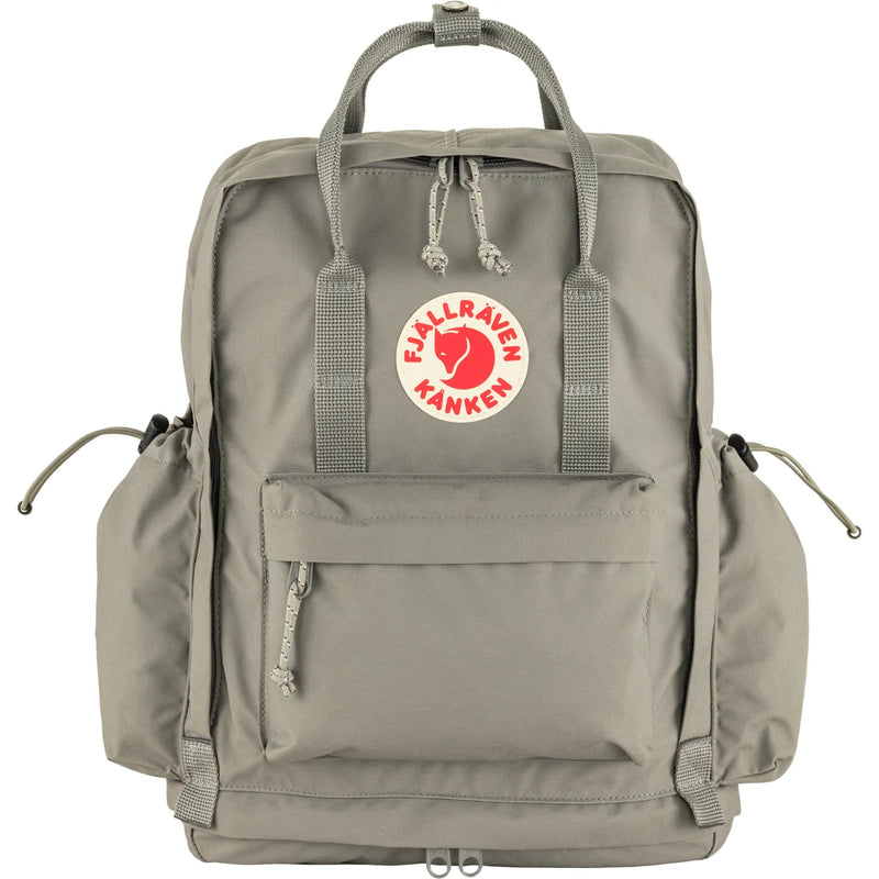 Fjallraven Kanken Outlong backpack in navy with top handle and adjustable shoulder straps, front zip pocket, and logo patch.