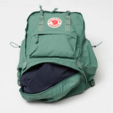 Fjallraven Kanken Outlong backpack in dark green with logo patch, featuring a spacious design and adjustable shoulder straps.