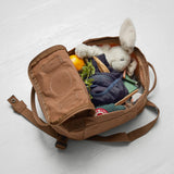 Fjallraven Kanken Mini backpack in G-Model color, featuring a compact design with top handle and adjustable shoulder straps.