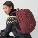 Fjallraven Raven 28 backpack in black with adjustable shoulder straps and front pocket, stylish and durable for hiking or daily use.
