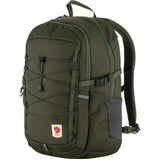 Fjallraven Skule 20 backpack in green with adjustable shoulder straps and front pocket, designed for everyday use.