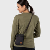 Black Fjallraven Pocket Bag crossbody bag with adjustable strap and compact design, made from durable material.