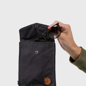 Black Fjallraven Pocket Bag crossbody bag with adjustable strap and front pocket, made of durable material.